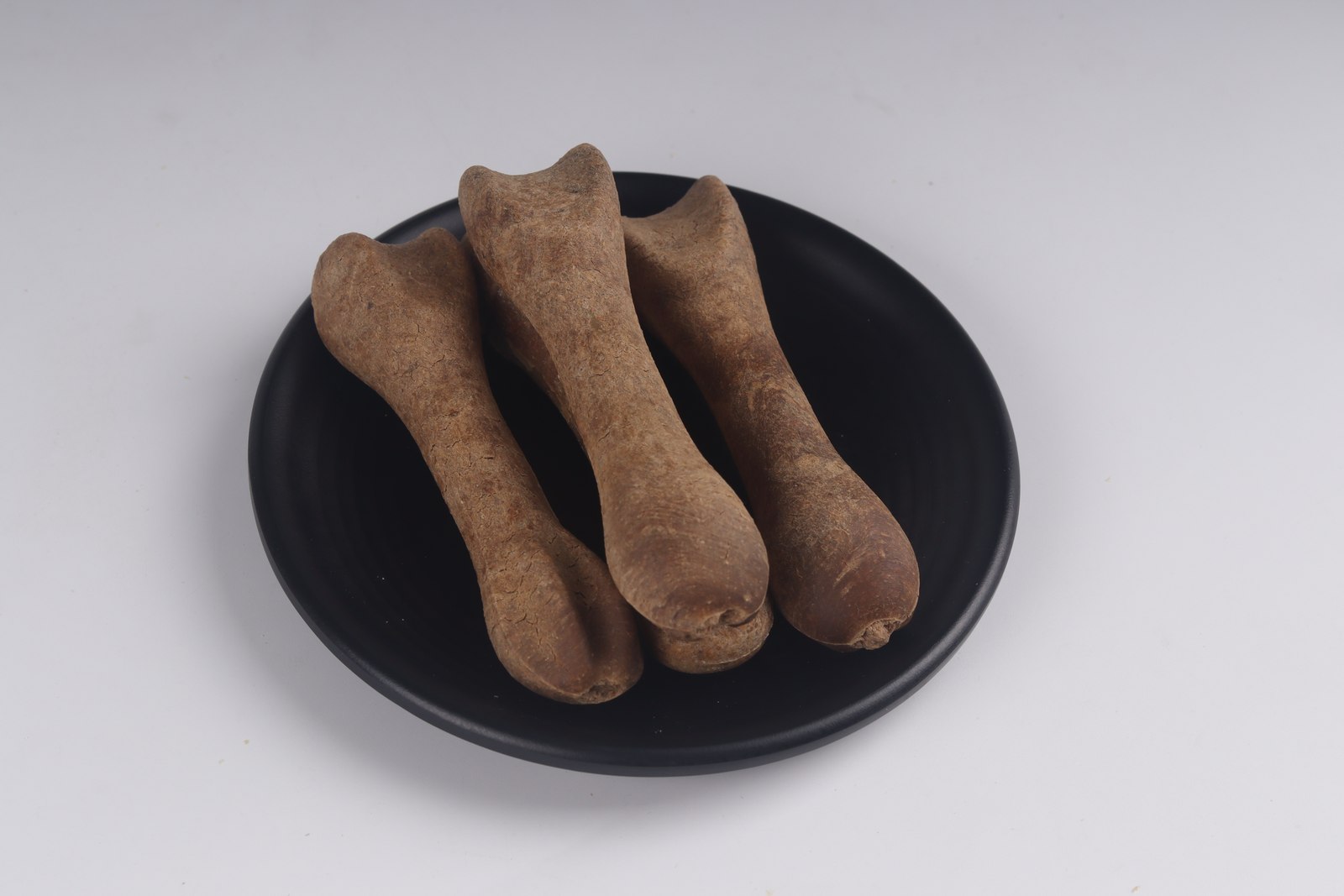 Flavoured bone-shaped chew
