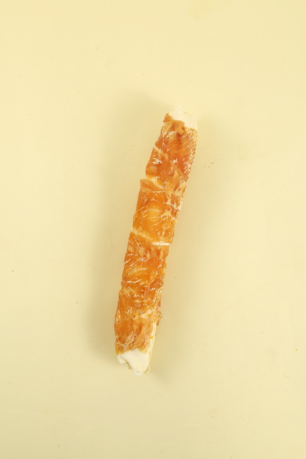 Chicken-coated bovine rawhide stick