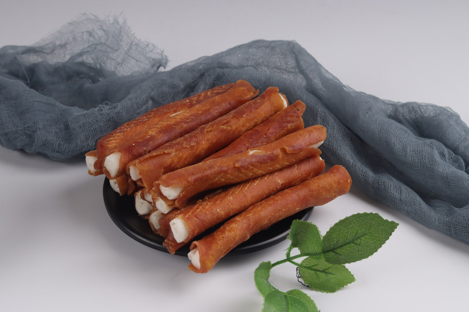 Duck-coated bovine rawhide rolls