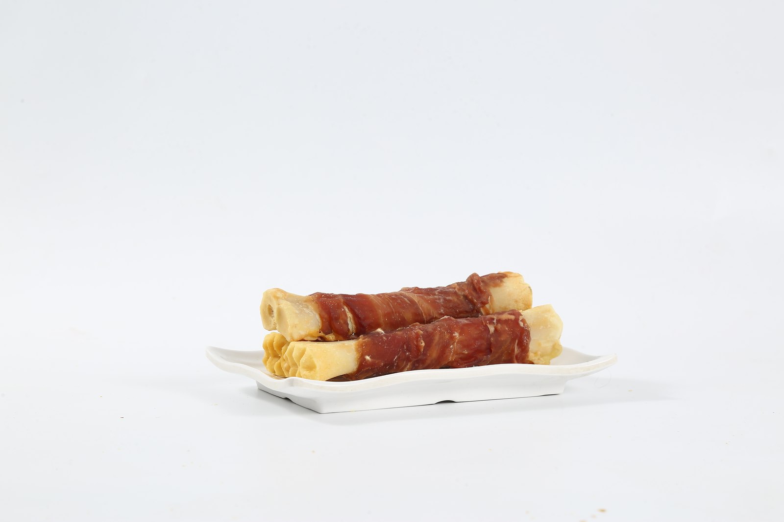 Duck-wrapped lamb trotter bone